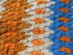 VINTAGE AFGHAN ORANGE BLUE & WHITE 51″ W x 85″ L HANDMADE WARM COZY CROCHET